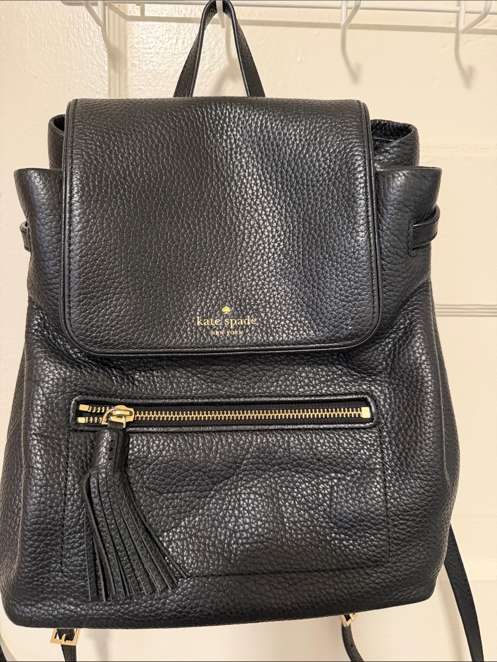 kate spade Black Pebbled Leather Tassel Backpack with Gold Hardware